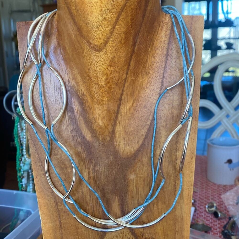 Lizzy James wavy silver tone 4 strand cord necklace